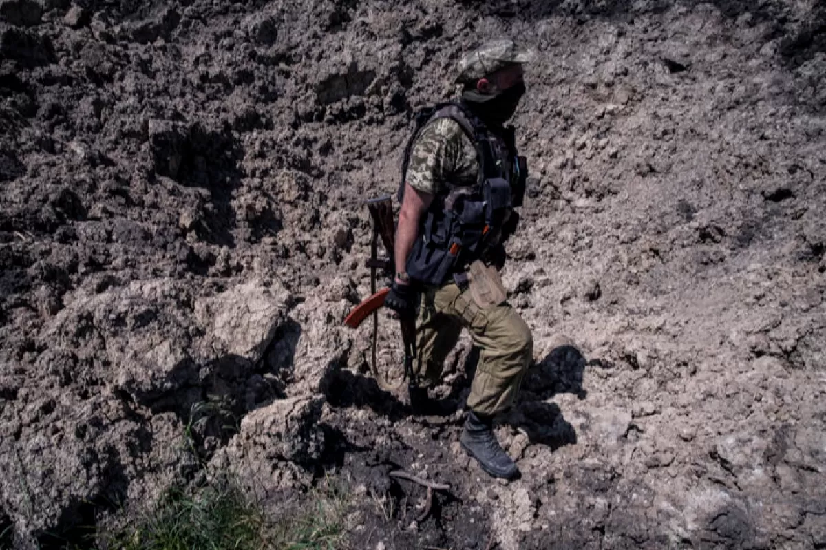 RĂZBOI ÎN UCRAINA: Groapă comună cu sute de cadavre, descoperită într-un oraş eliberat recent de sub ocupaţie rusă