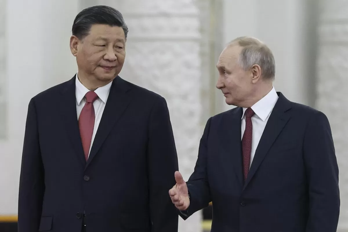 Xi la Moscova: colac de salvare pentru Putin, bani și prestigiu pentru China